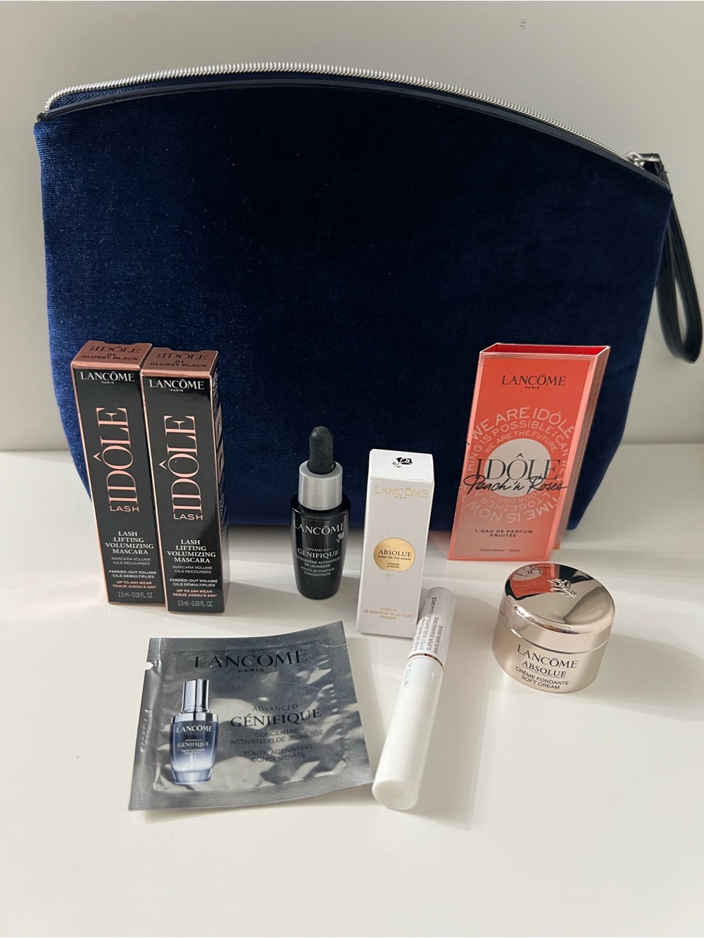 Lancome New Navy Blue  Cosmetic bag plus 8 samples.